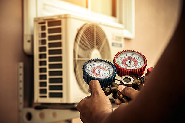 Professional Hvac technician working in Hyde Park, MA